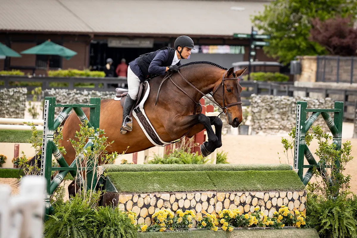 Horse and rider competing at Tryon as part of the Charming Bay Farm program